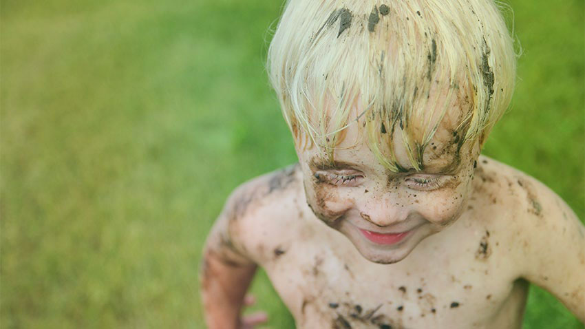Child playing in the dirt